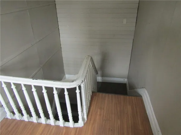 a view of entryway with wooden floor