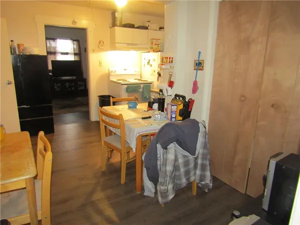 a kitchen with stainless steel appliances a sink stove and refrigerator