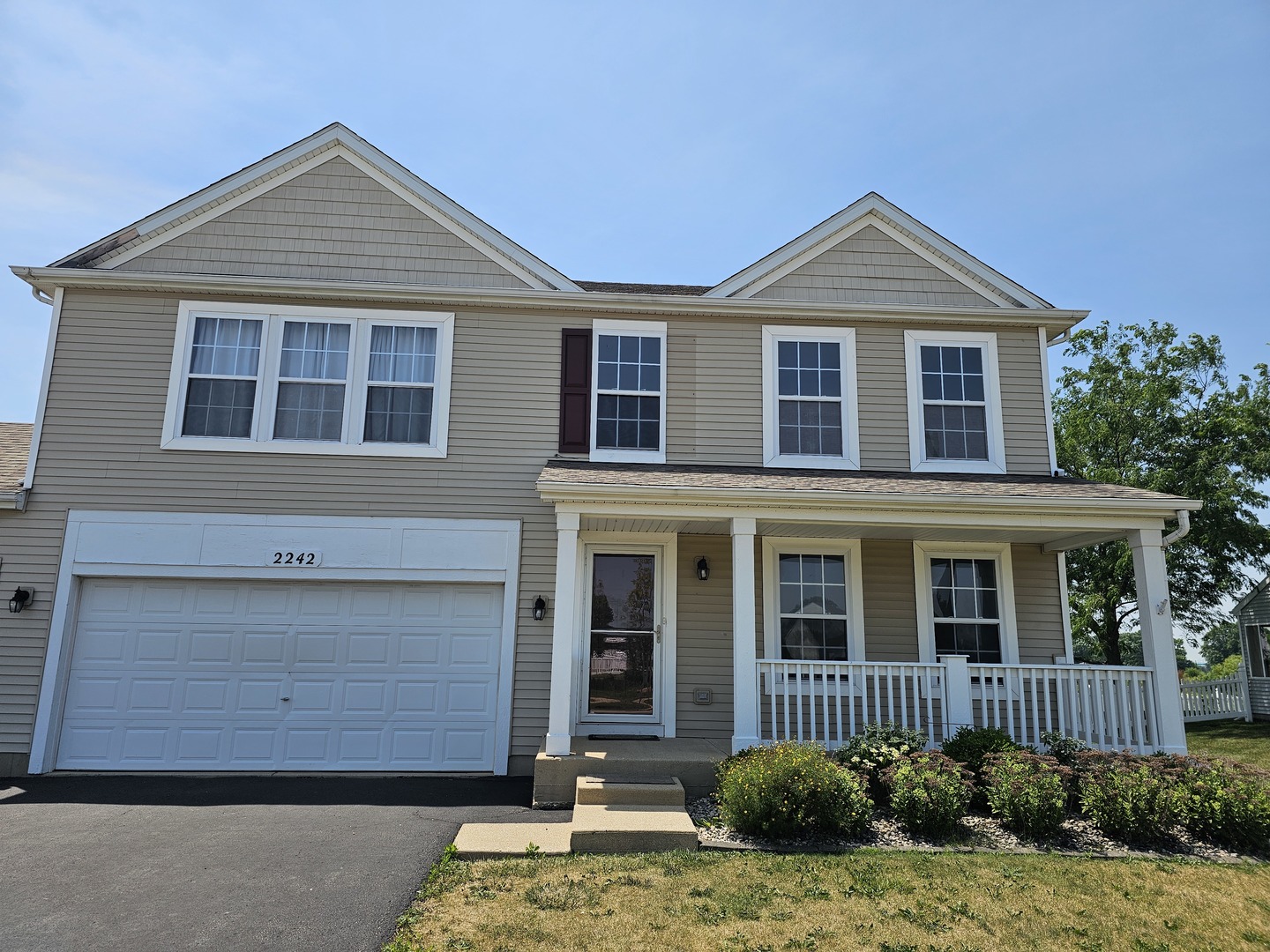 2242 Crescent Street Bourbonnais, IL 60914 - Photo 1 of 1 a front view of a house with a yard
