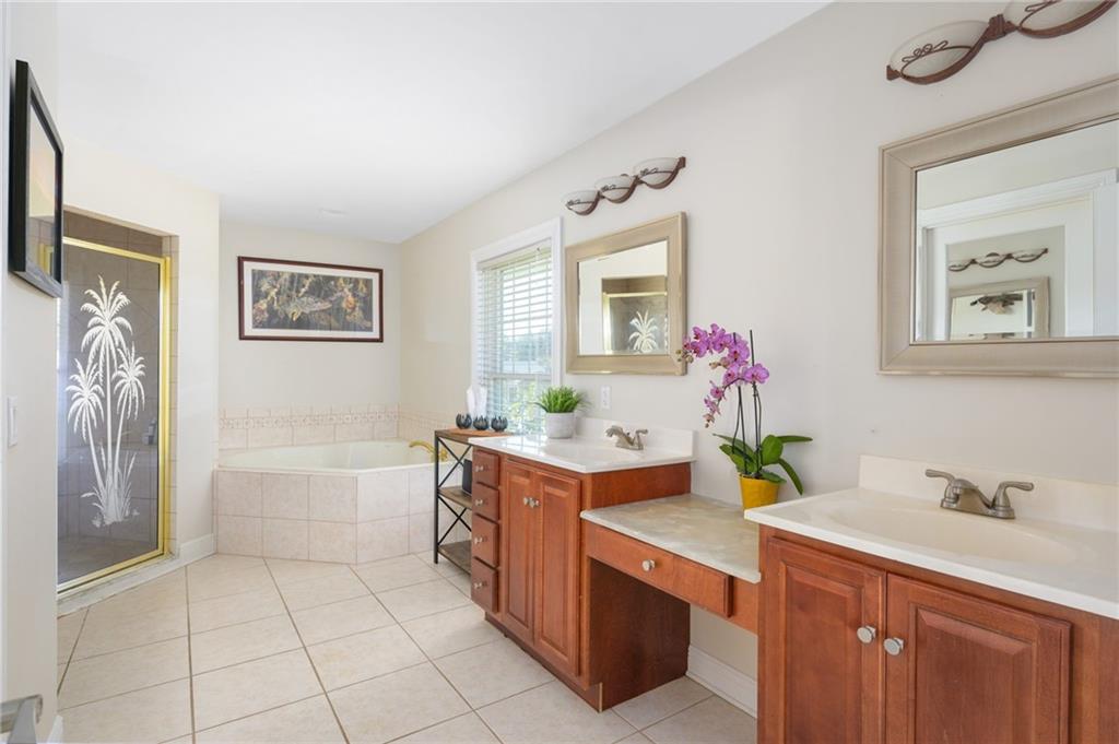 5440 95th Street Sebastian, FL 32958 - Photo 18 of 36 a kitchen with a cabinets and sink