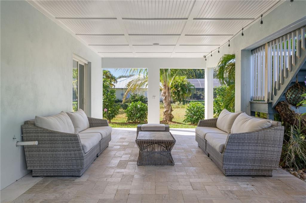 5440 95th Street Sebastian, FL 32958 - Photo 29 of 36 a living room with furniture and a large window
