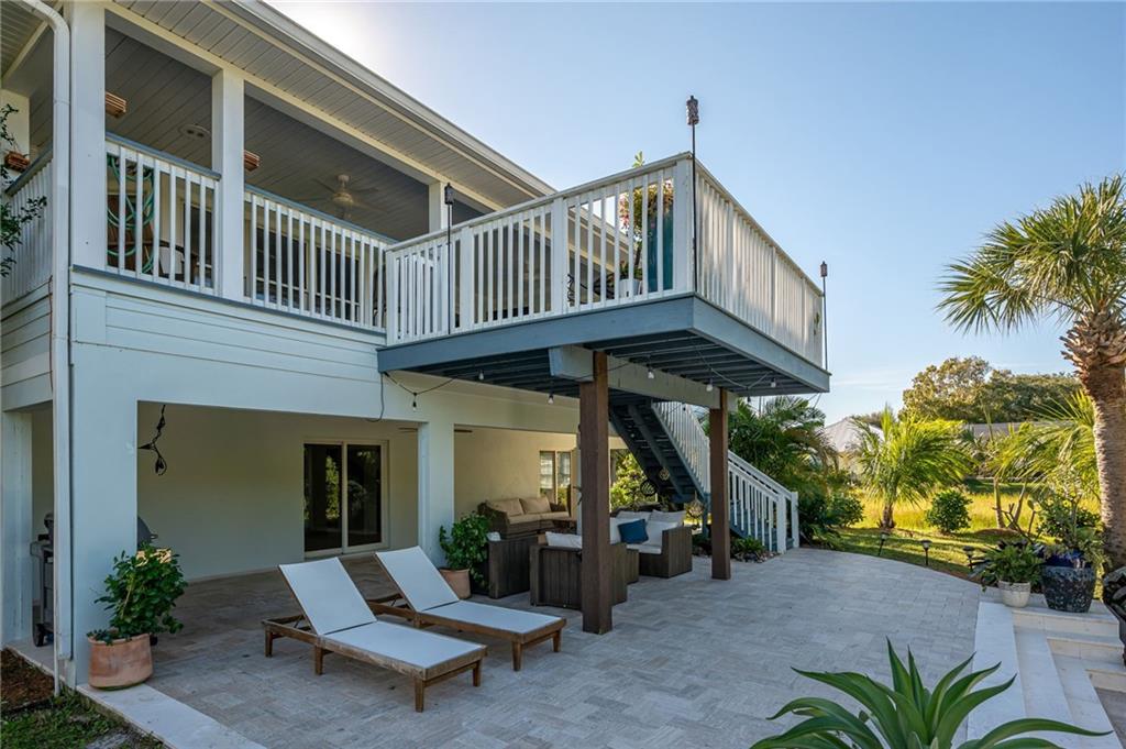 5440 95th Street Sebastian, FL 32958 - Photo 33 of 36 a view of a building with sitting area