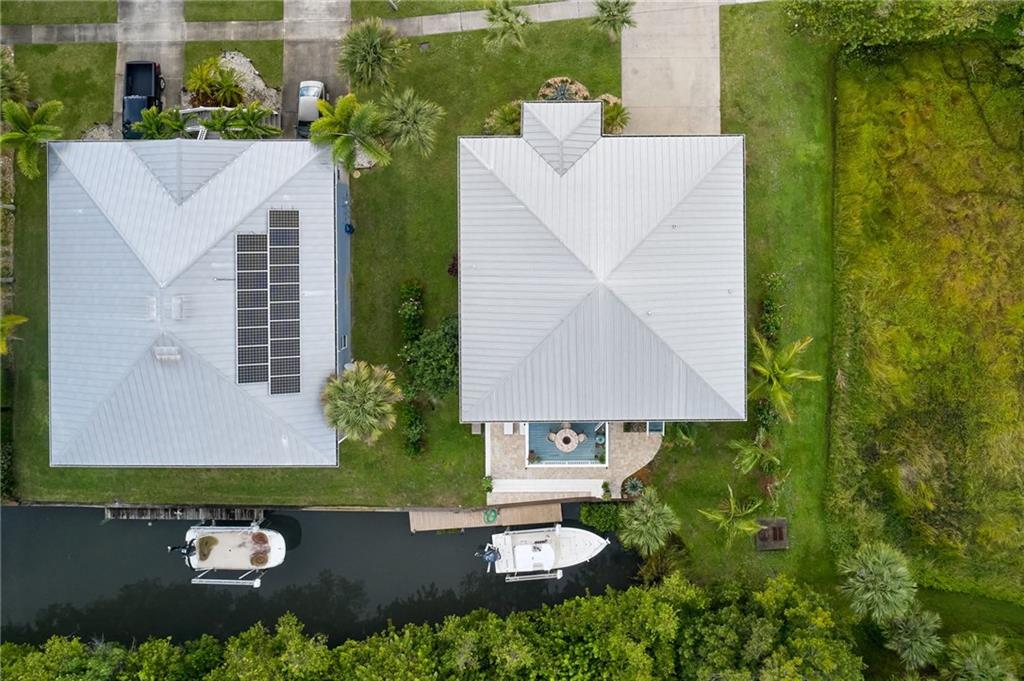 5440 95th Street Sebastian, FL 32958 - Photo 36 of 36 an aerial view of a house having yard