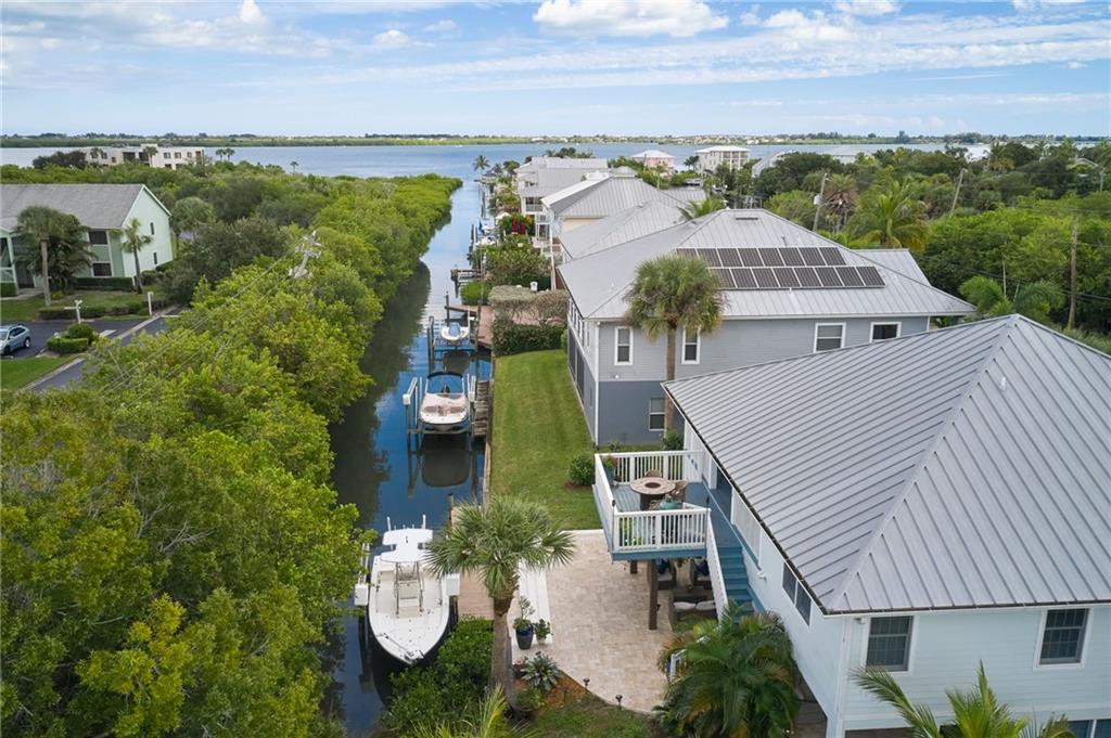 5440 95th Street Sebastian, FL 32958 - Photo 5 of 36 an aerial view of a house with outdoor space