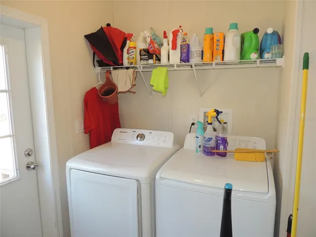 a utility room with dryer and washer