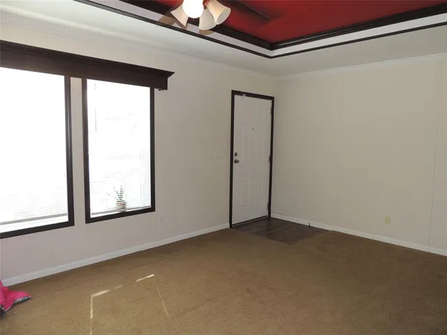 a view of an empty room and window
