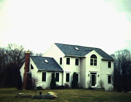 73 Beardsley Road New Milford, CT 06776 - Photo 1 of 1 a front view of a house with garden