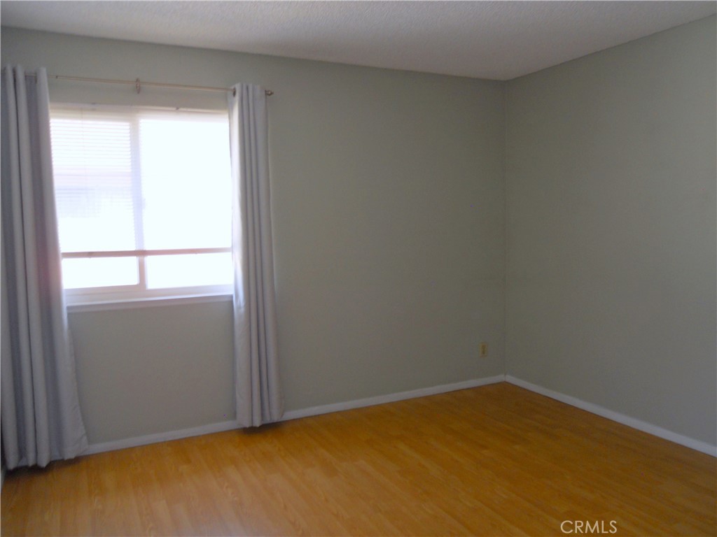 750 East 5th Street, Unit 51 Azusa, CA 91702 - Photo 14 of 59 an empty room with a window