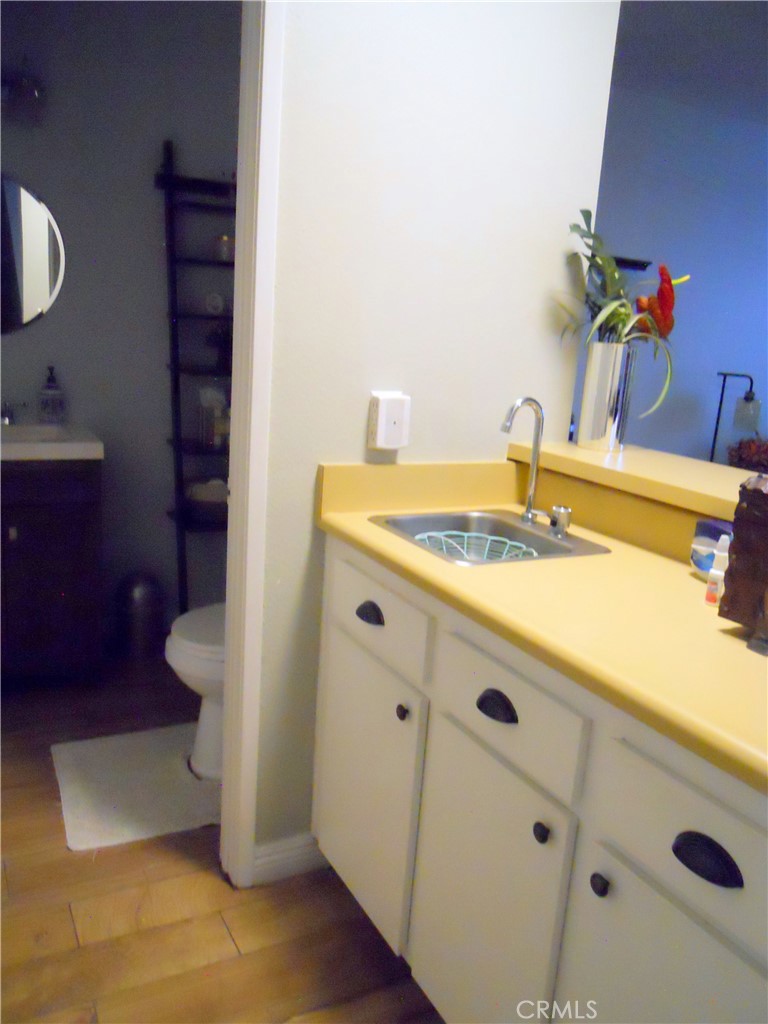 750 East 5th Street, Unit 51 Azusa, CA 91702 - Photo 31 of 59 a bathroom with a sink and a vanity