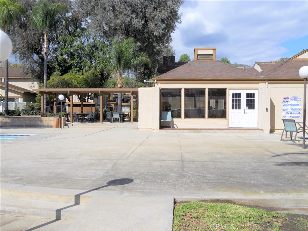 750 East 5th Street, Unit 51 Azusa, CA 91702 - Photo 44 of 59 front view of a house with a porch