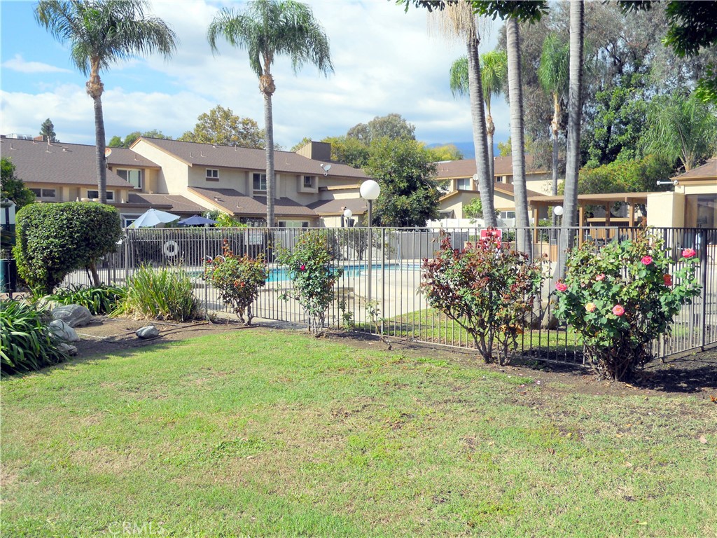 750 East 5th Street, Unit 51 Azusa, CA 91702 - Photo 49 of 59 a view of a garden with a building