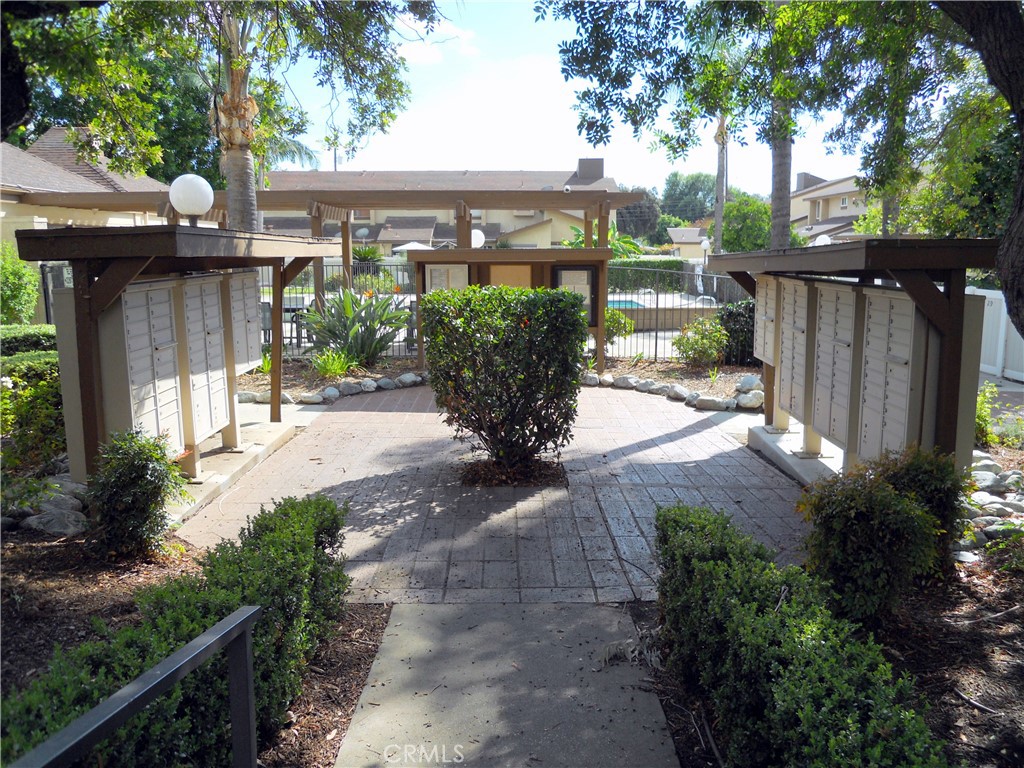 750 East 5th Street, Unit 51 Azusa, CA 91702 - Photo 50 of 59 a view of a back yard of the house with a patio