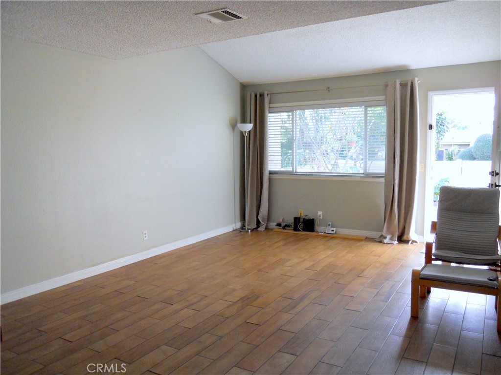750 East 5th Street, Unit 51 Azusa, CA 91702 - Photo 9 of 59 an empty room with windows