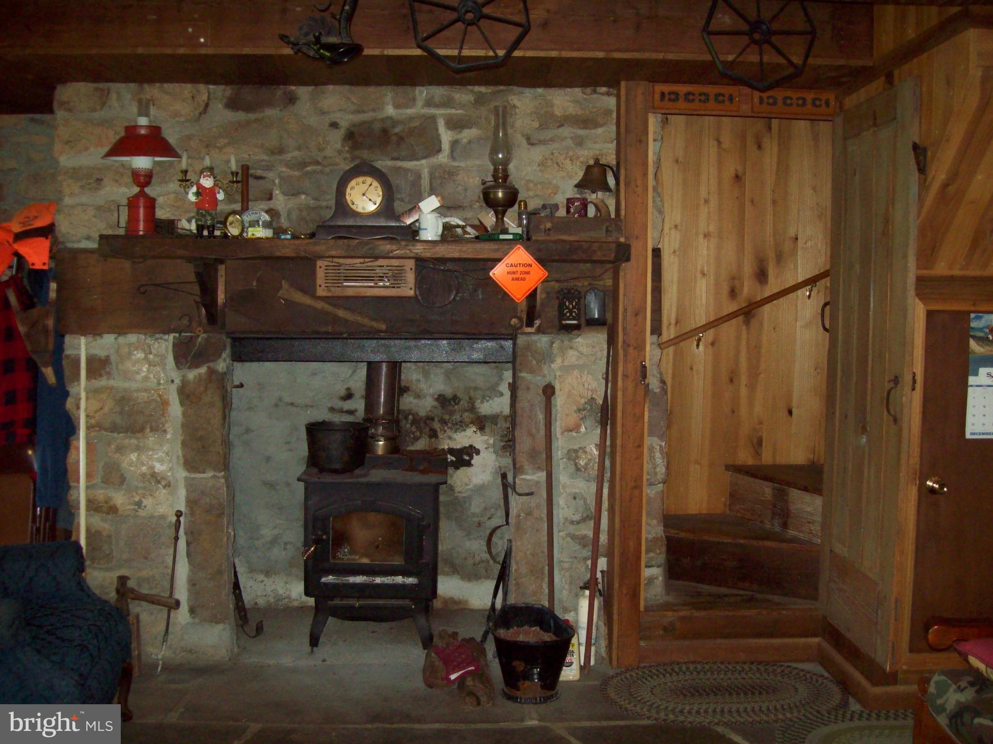9255 Sweetwater Road Fort Loudon, PA 17224 - Photo 7 of 17 Woodstove insert in Stone Fireplace