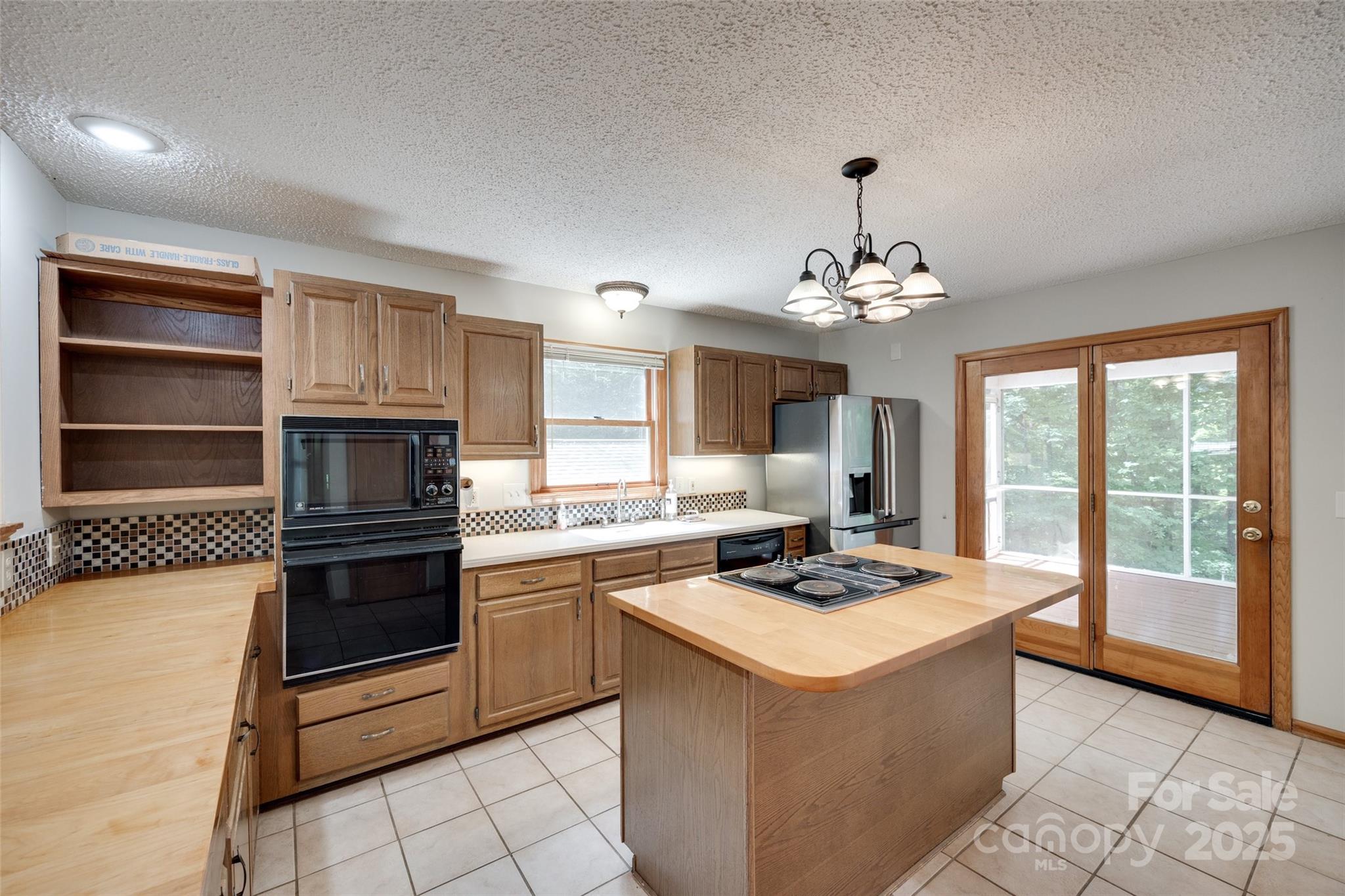 25056 Timberlake Drive Fort Mill, SC 29708 - Photo 15 of 37 a kitchen that has a stove and a microwave
