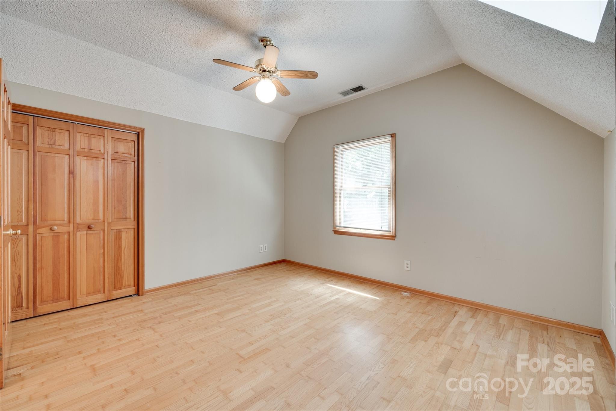 25056 Timberlake Drive Fort Mill, SC 29708 - Photo 20 of 37 an empty room with windows and fan