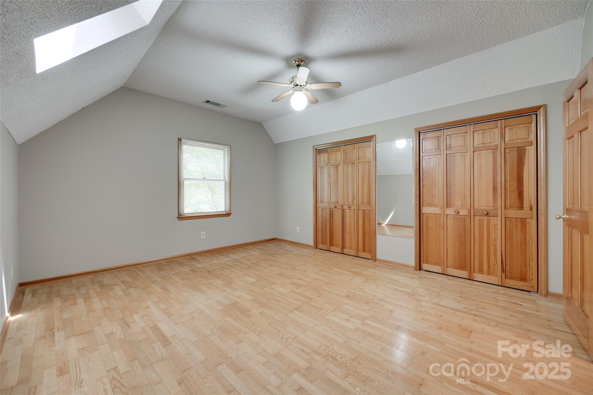 25056 Timberlake Drive Fort Mill, SC 29708 - Photo 22 of 37 an empty room with fan and windows