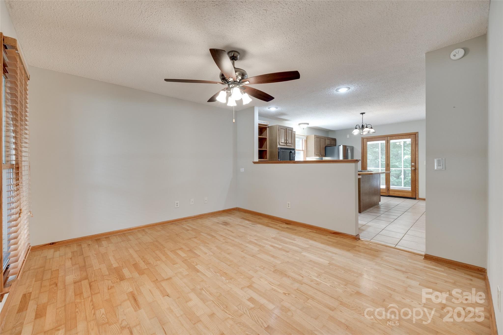 25056 Timberlake Drive Fort Mill, SC 29708 - Photo 30 of 37 a view of an empty room with a kitchen