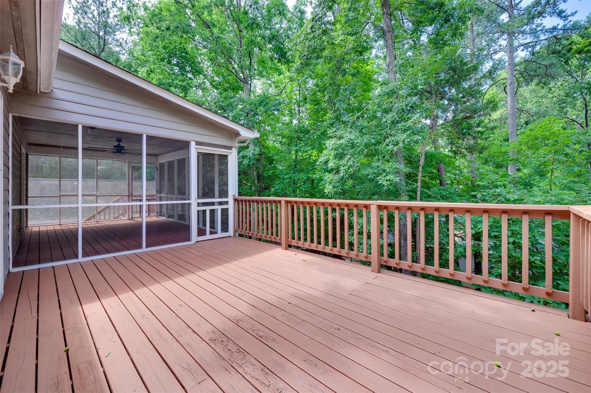 25056 Timberlake Drive Fort Mill, SC 29708 - Photo 9 of 37 a view of backyard with deck and wooden floor