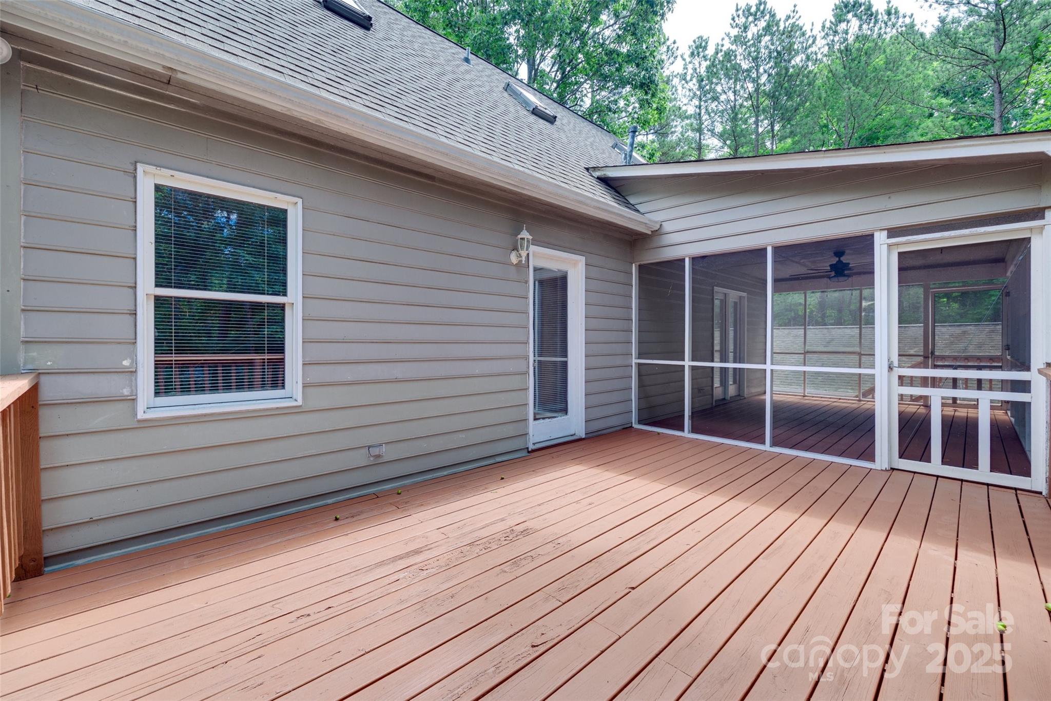 25056 Timberlake Drive Fort Mill, SC 29708 - Photo 10 of 37 a view of backyard with deck and wooden floor