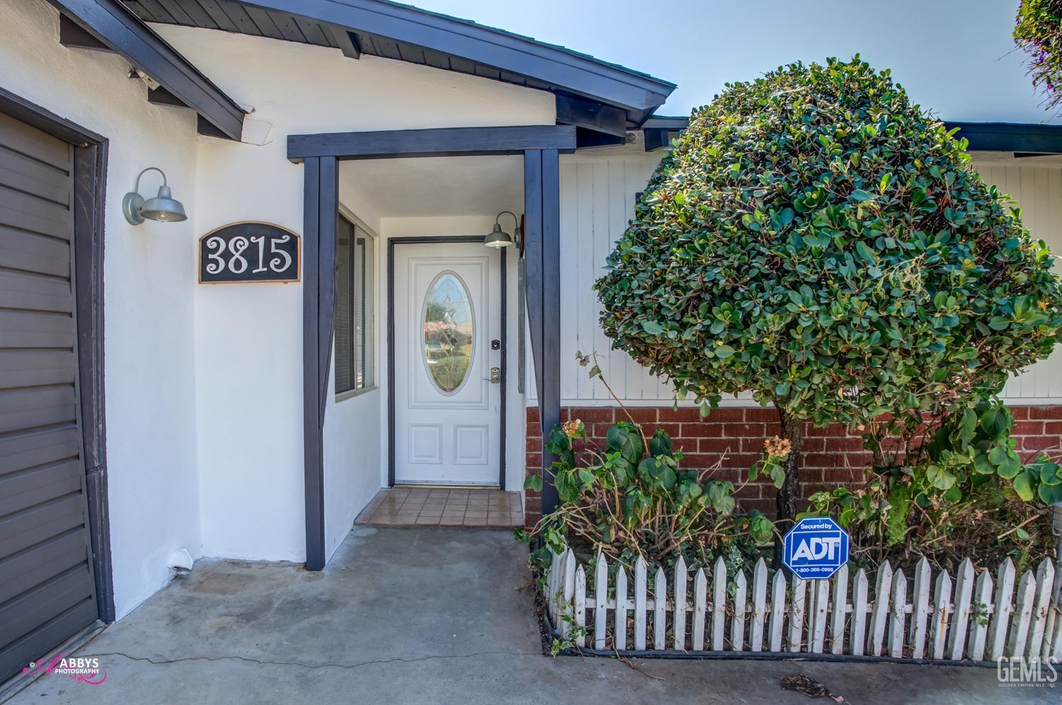 Undisclosed Address Bakersfield, CA 93309 - Photo 15 of 21 a view of entryway with a flower garden