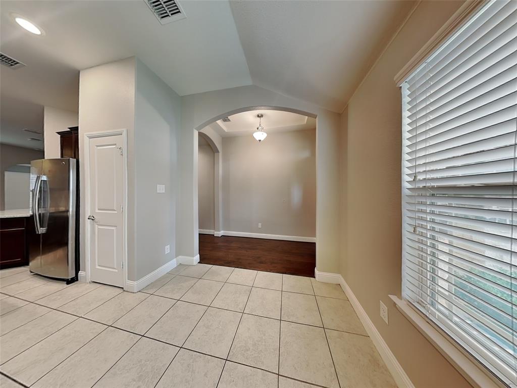7248 Laguna Del Campo Trail Fort Worth, TX 76131 - Photo 4 of 15 a view of a livingroom with an empty space and a window