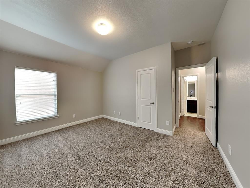7248 Laguna Del Campo Trail Fort Worth, TX 76131 - Photo 10 of 15 an empty room with windows and closet