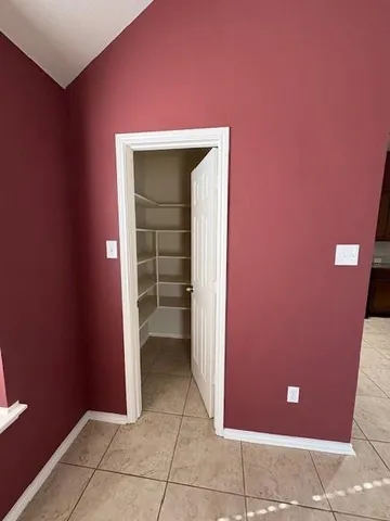 a bathroom with a tub and a shower