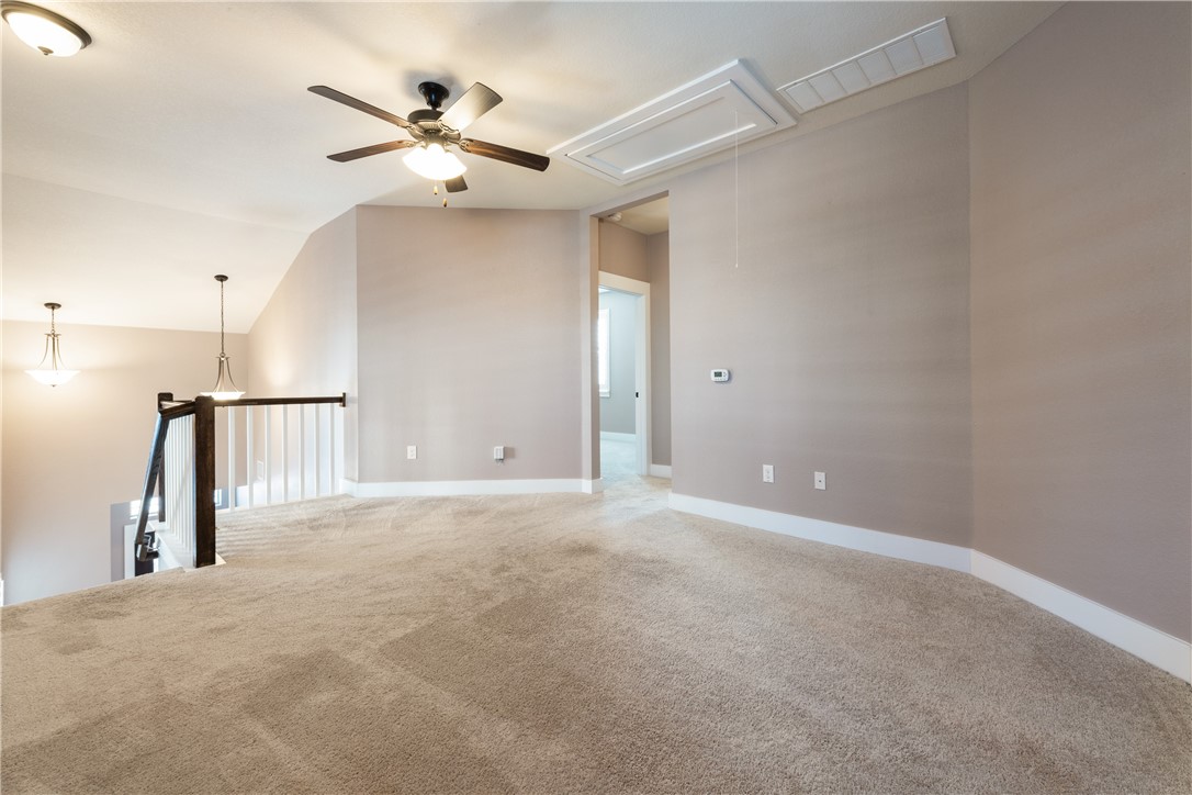 7811 Wildcat Pass Austin, TX 78757 - Photo 12 of 24 a view of a livingroom with a ceiling fan