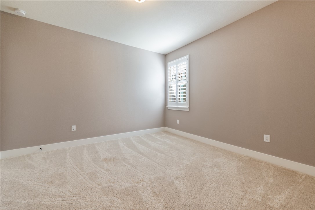 7811 Wildcat Pass Austin, TX 78757 - Photo 13 of 24 a view of an empty room with a window