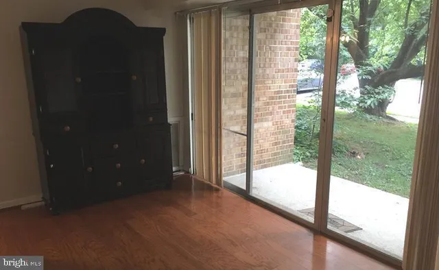 a view of a glass door and porch