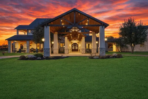 front view of a house with a small yard