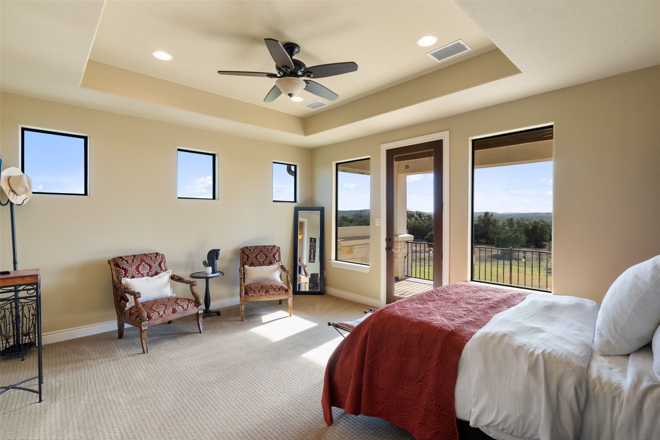 7220 Creek Road Dripping Springs, TX 78620 - Photo 17 of 40 Bedroom #3 located upstairs with en-suite bathroom and access to upstairs deck ares.