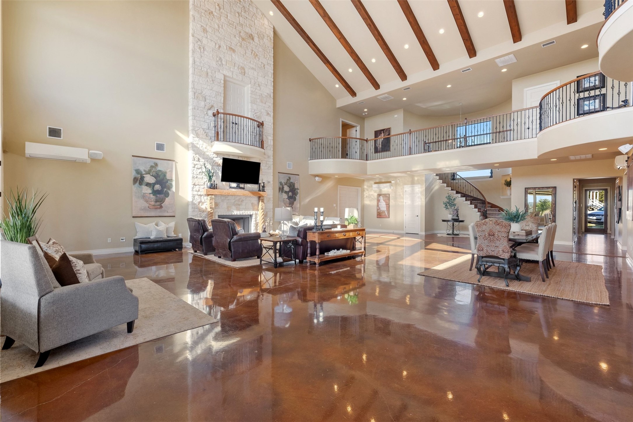 7220 Creek Road Dripping Springs, TX 78620 - Photo 10 of 40 a living room with furniture and a fireplace