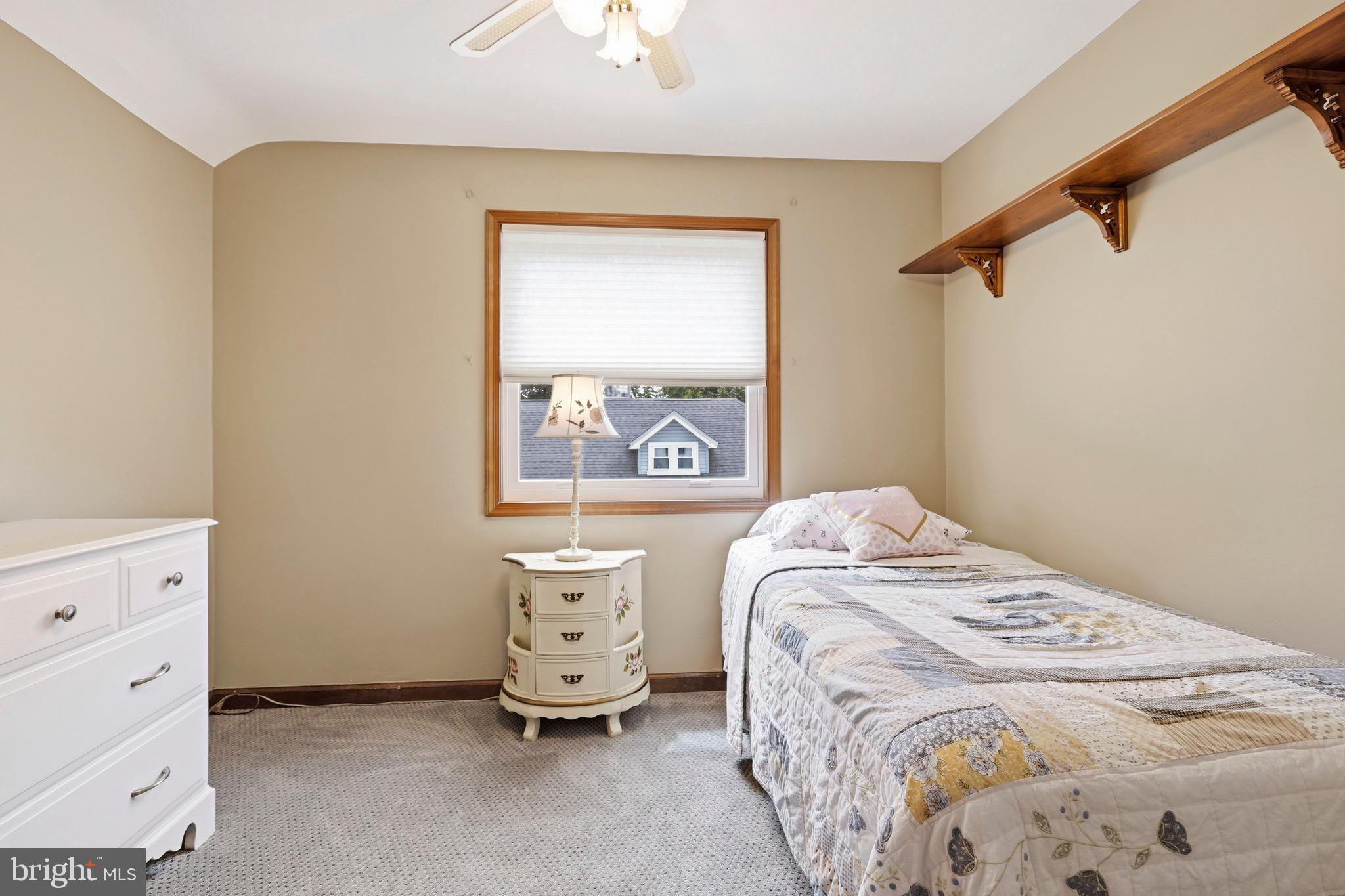 527 Saxer Avenue Springfield, PA 19064 - Photo 24 of 33 a bedroom with a bed and a window