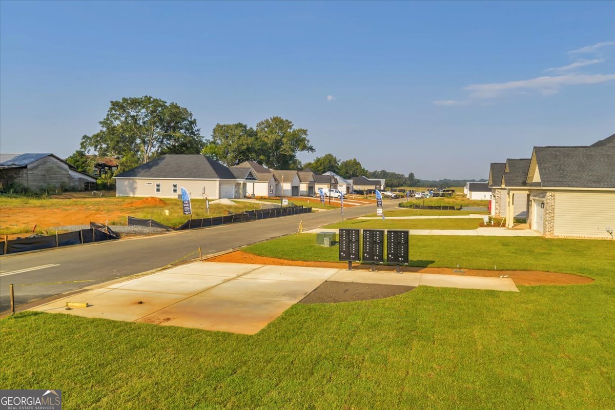 202 Eric Court Byron, GA 31008 - Photo 41 of 44 a view of a swimming pool with an ocean view