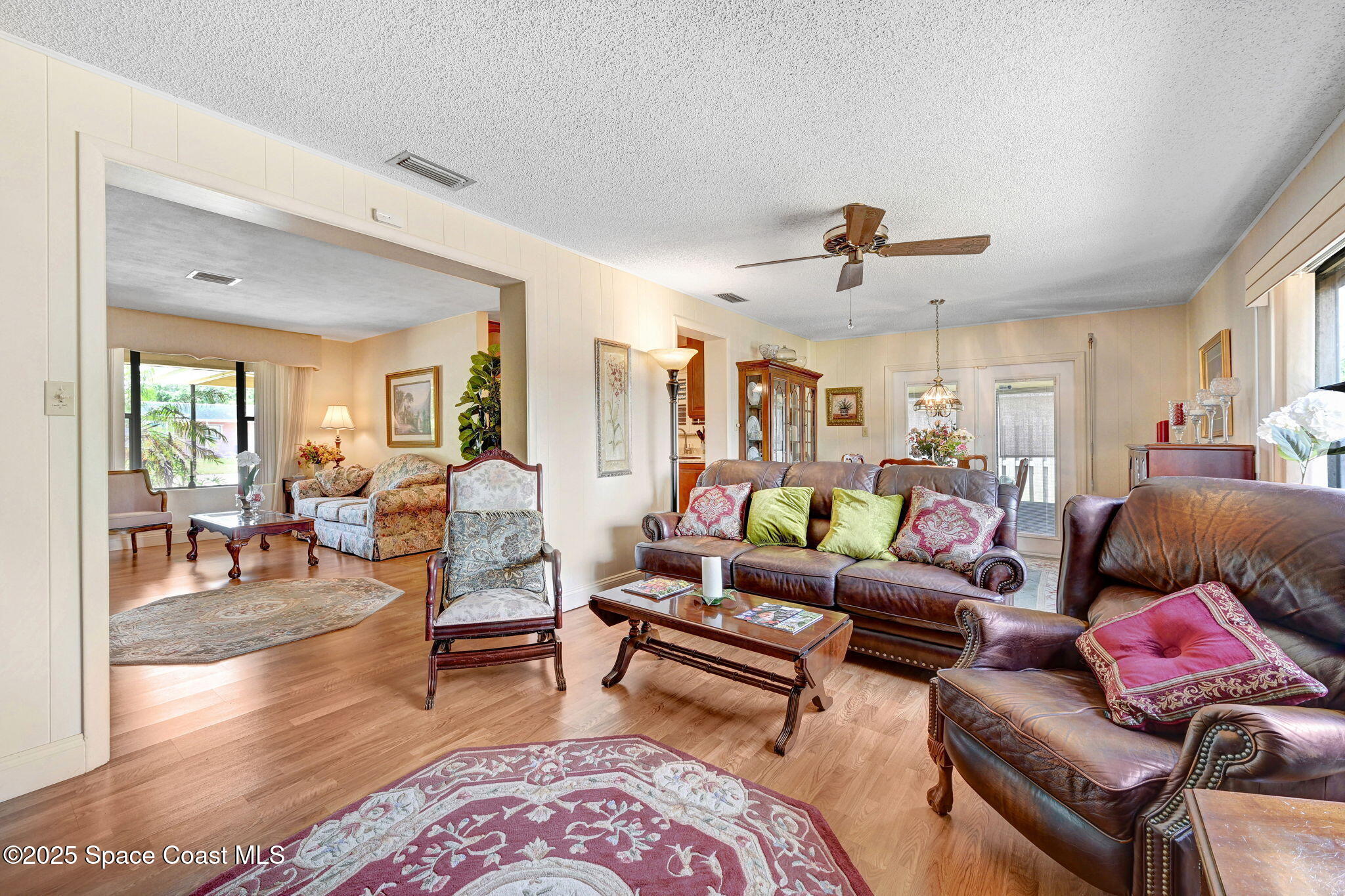 1208 Duke Way Cocoa, FL 32922 - Photo 16 of 34 a living room with furniture and wooden floor
