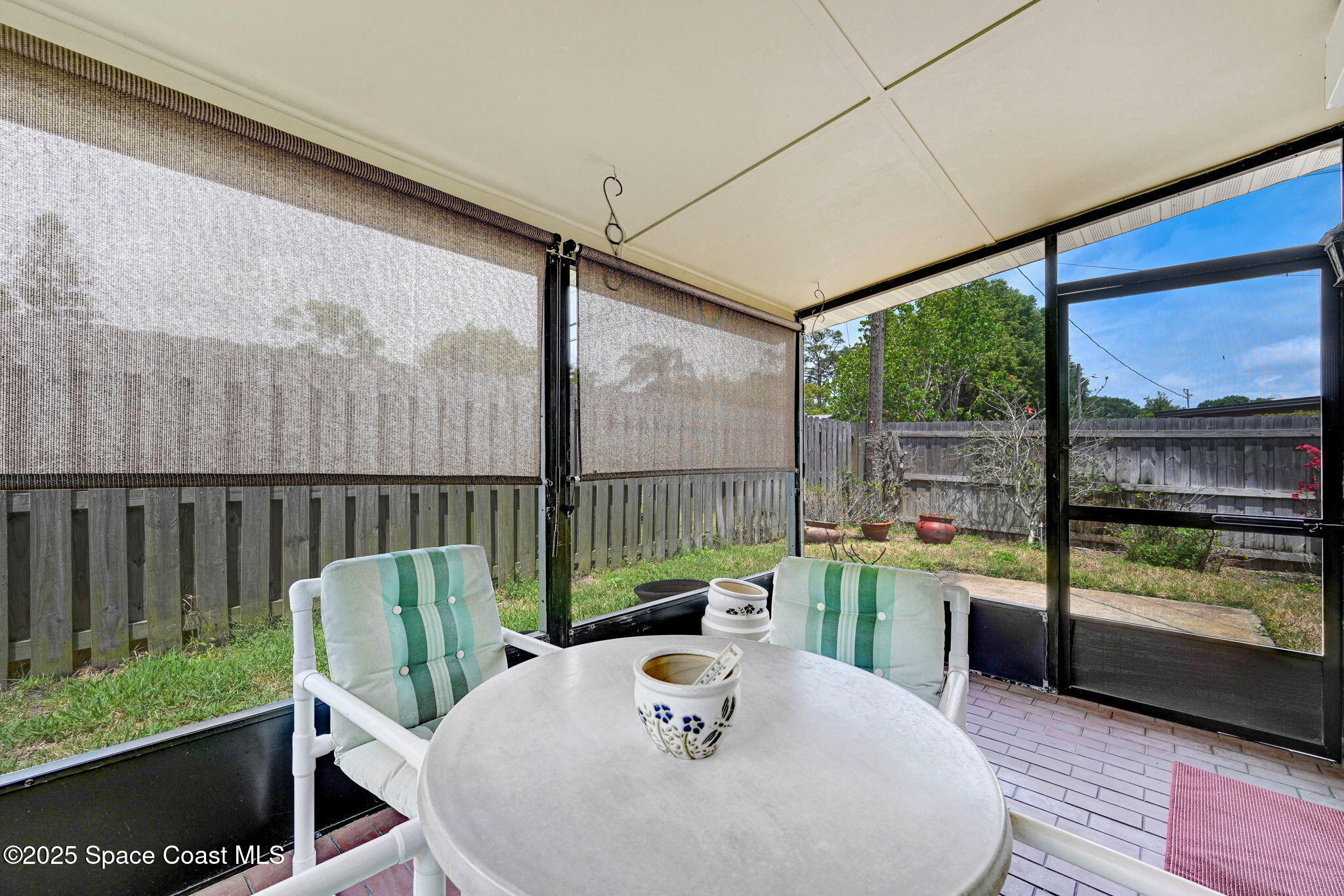 1208 Duke Way Cocoa, FL 32922 - Photo 21 of 34 a view of a dining room with furniture window and wooden floor