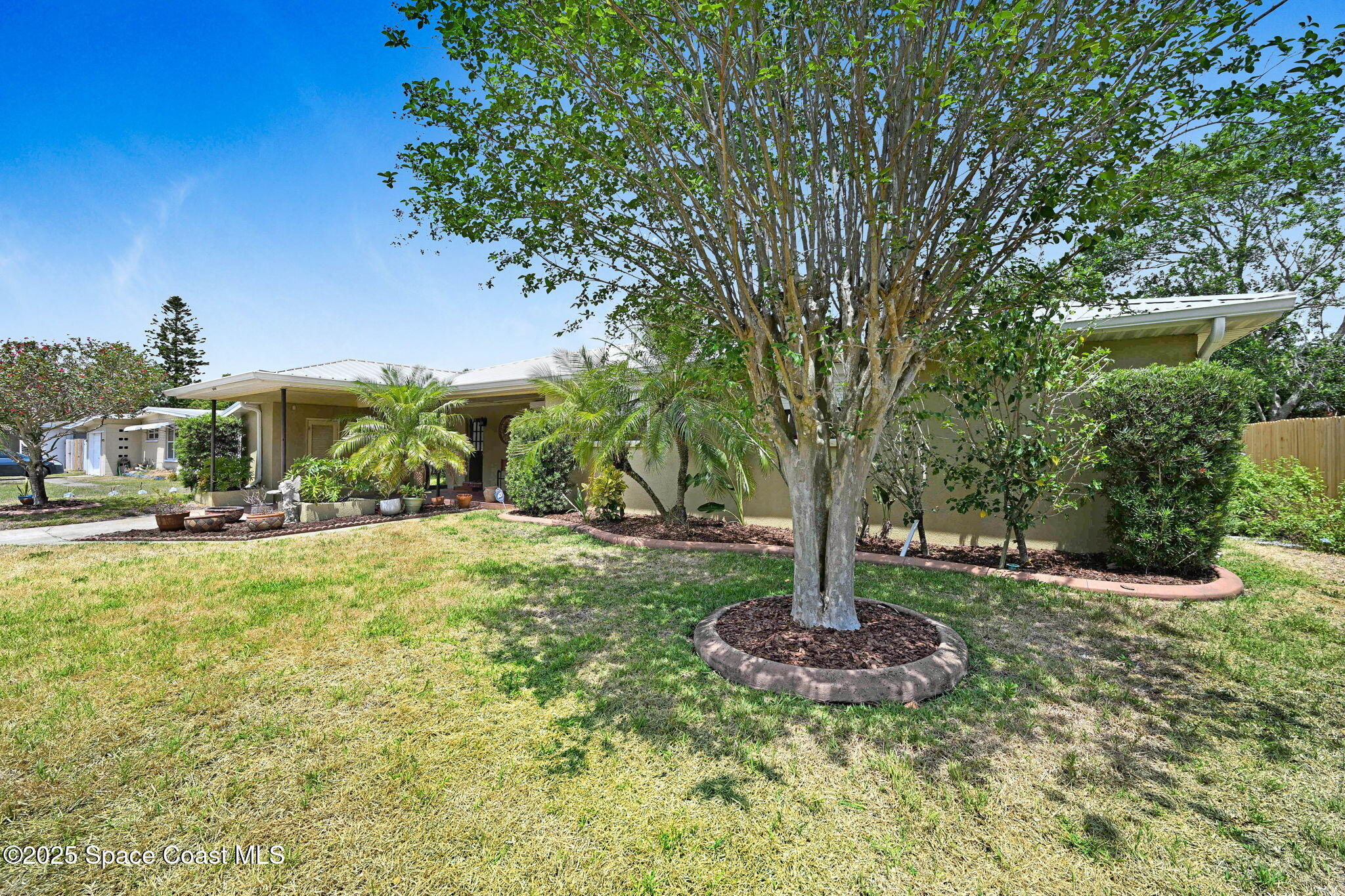 1208 Duke Way Cocoa, FL 32922 - Photo 29 of 34 a front view of a house with a yard