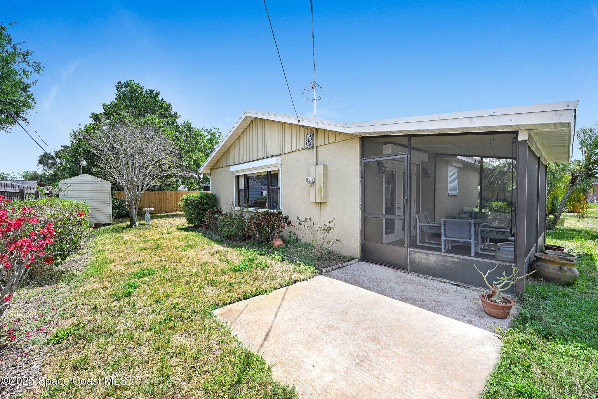 1208 Duke Way Cocoa, FL 32922 - Photo 31 of 34 a front view of a house with garden