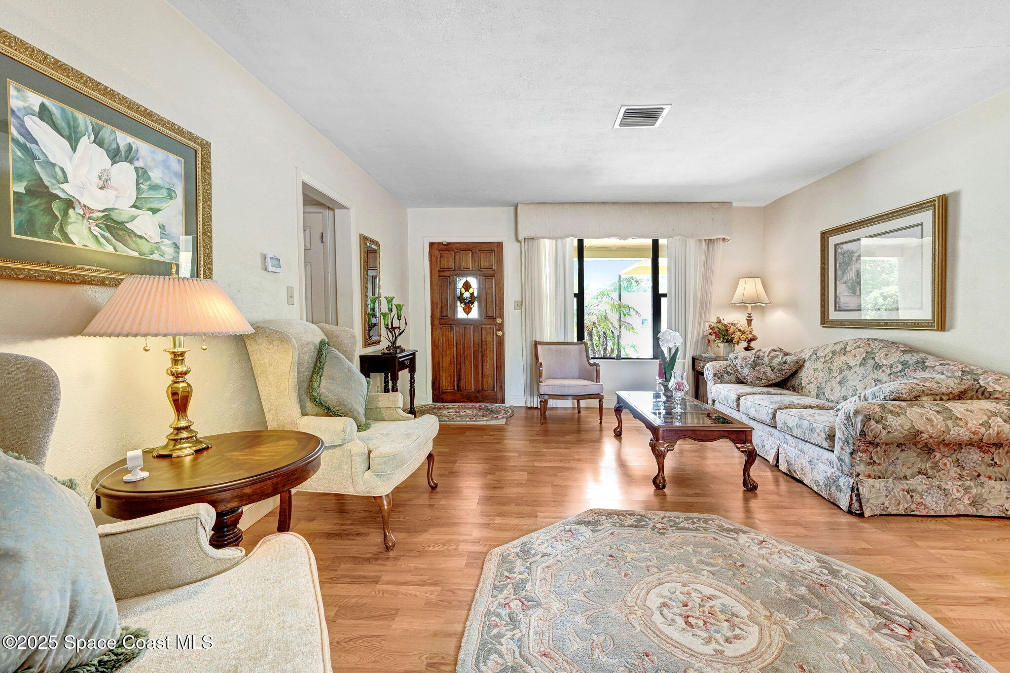 1208 Duke Way Cocoa, FL 32922 - Photo 6 of 34 a living room with furniture and a large window