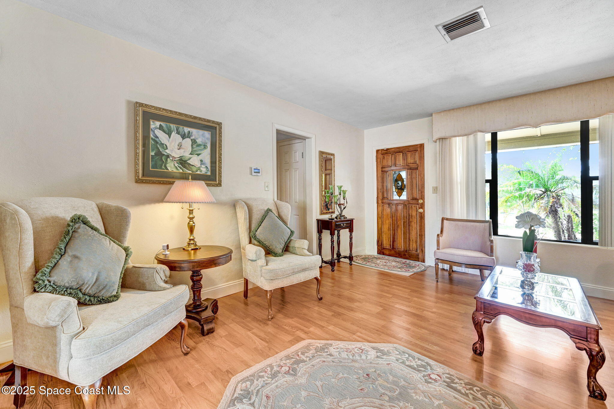 1208 Duke Way Cocoa, FL 32922 - Photo 7 of 34 a living room with furniture rug and window