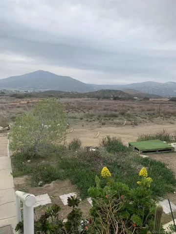 a view of dirt and river