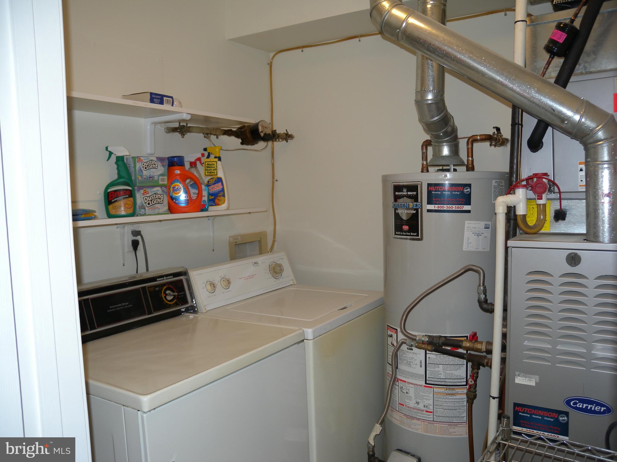 1907 A Sutton Place Mount Laurel, NJ 08054 - Photo 21 of 23 a storage room with washer and dryer