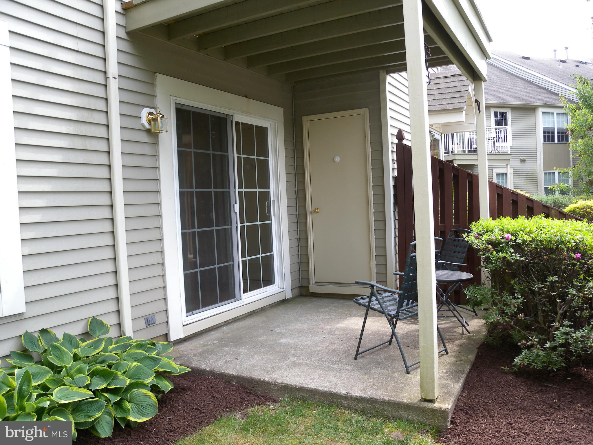 1907 A Sutton Place Mount Laurel, NJ 08054 - Photo 22 of 23 a view of a house with porch and a porch