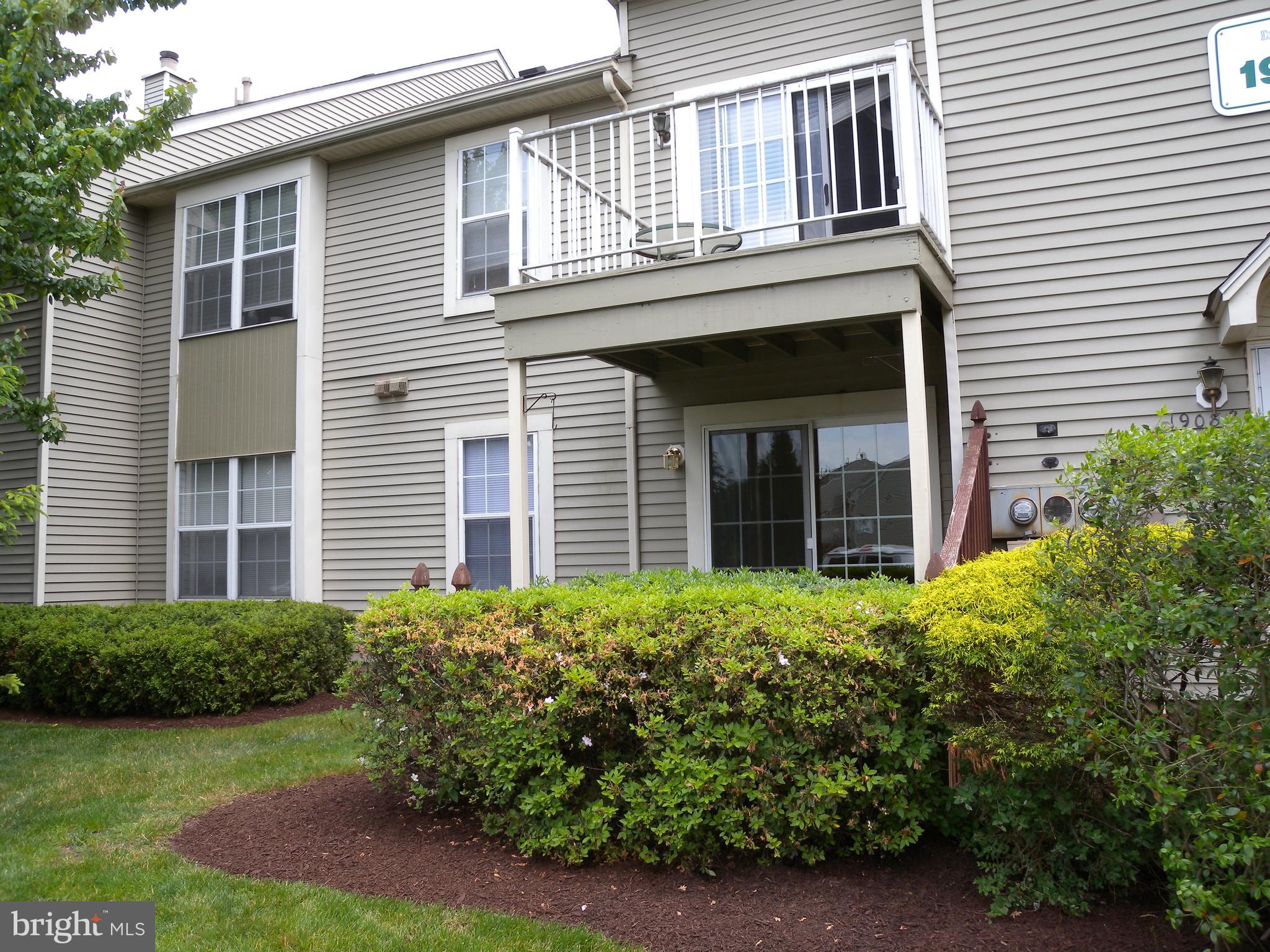 1907 A Sutton Place Mount Laurel, NJ 08054 - Photo 23 of 23 a house with a garden view
