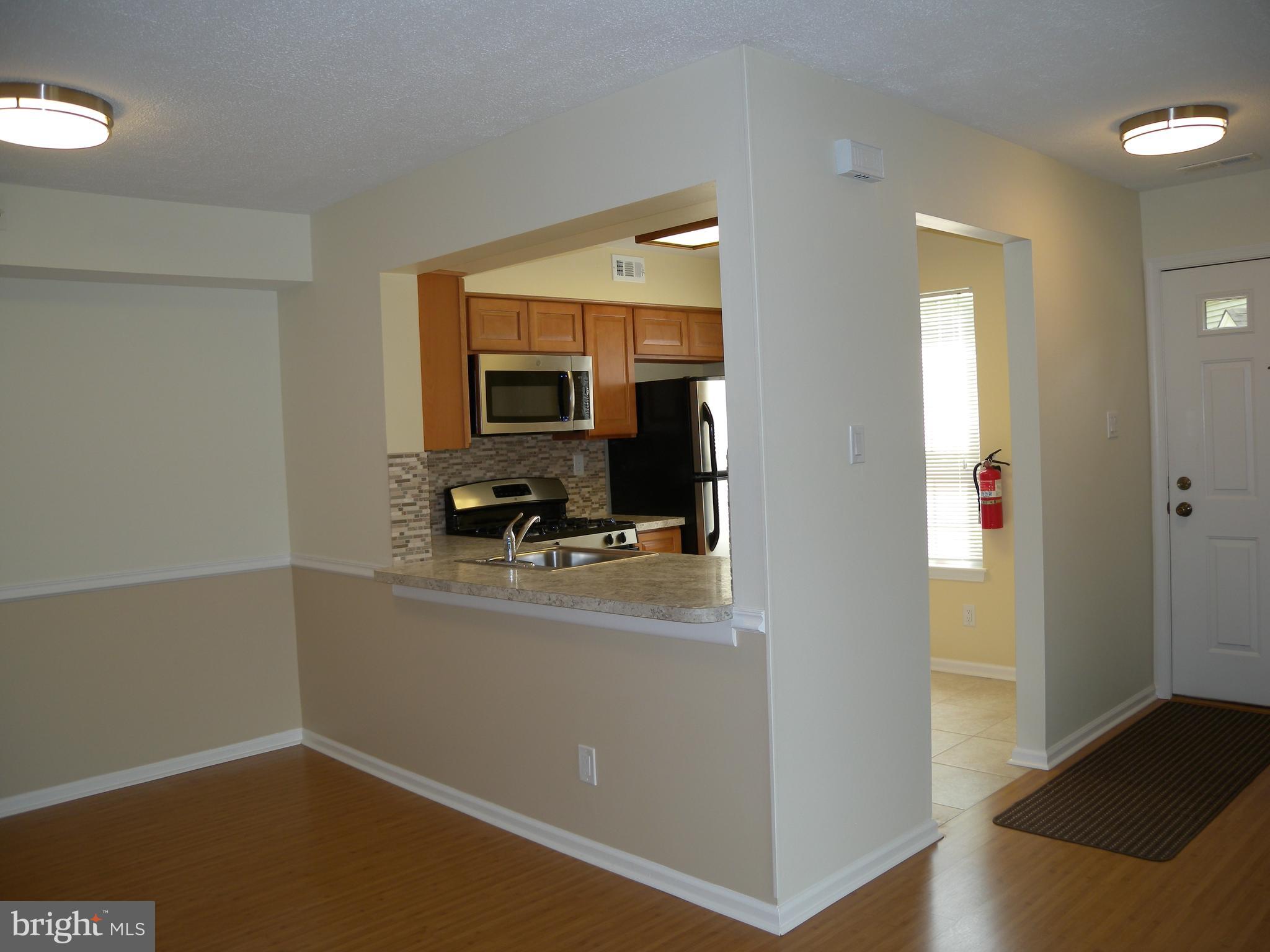 1907 A Sutton Place Mount Laurel, NJ 08054 - Photo 8 of 23 a view of a hallway with workspace
