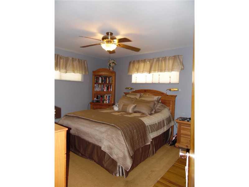 546 Wible Run Road Pittsburgh, PA 15209 - Photo 8 of 16 Master Bedroom. The master bedroom also has hardwood flooring and a ceiling fan.