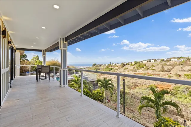a view of balcony with furniture