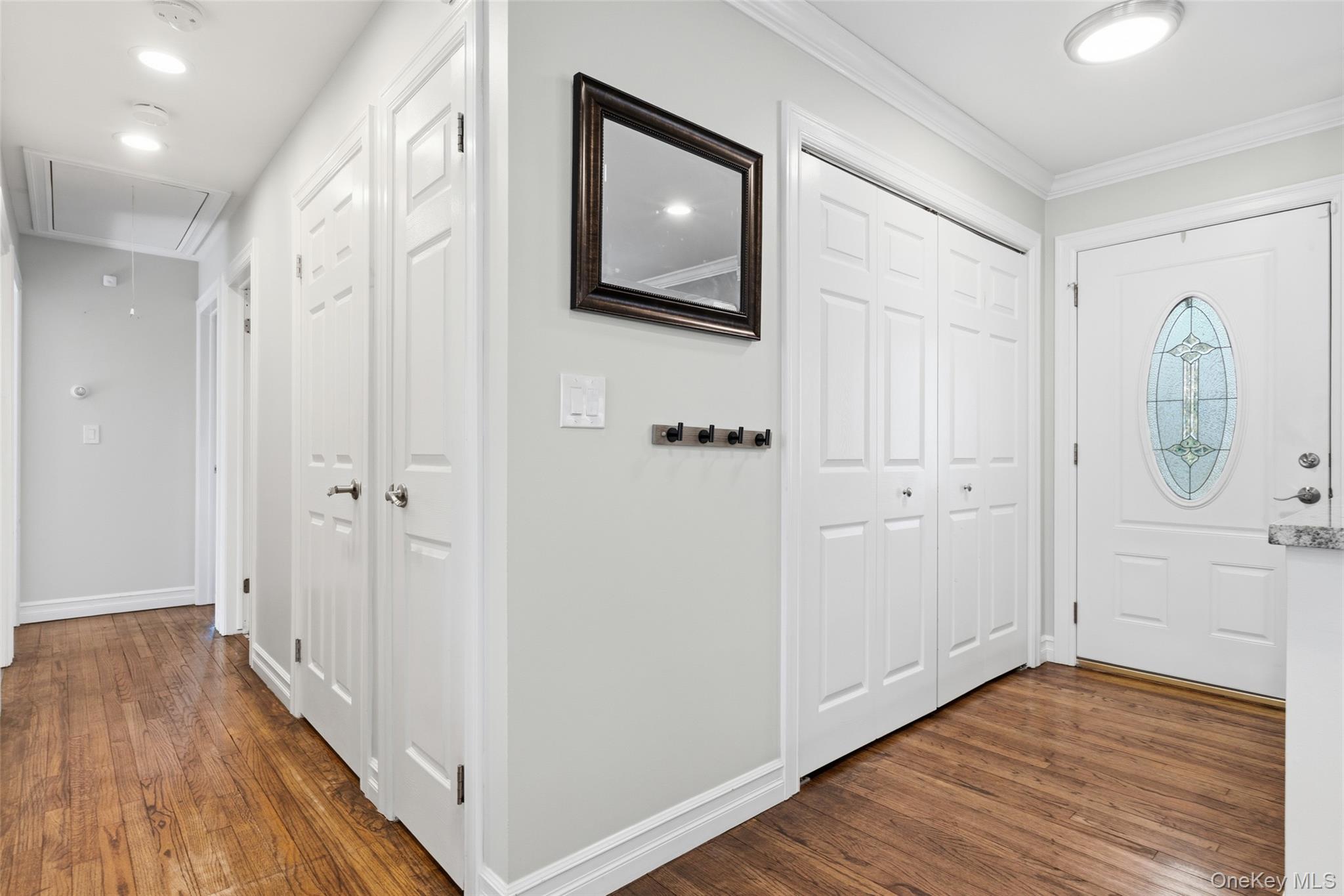39 Benjamin Road Mahopac, NY 10541 - Photo 13 of 39 Entryway with wood finished floors, Plenty of closets and ornamental molding